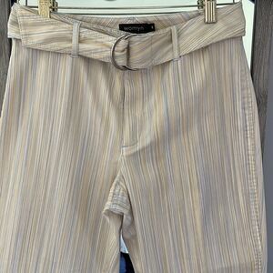 Womyn Cropped Striped Pants with belt buckles.‎ Size 6 Yellow/gray tones.